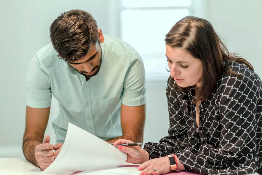 Man and woman looking at paperwork