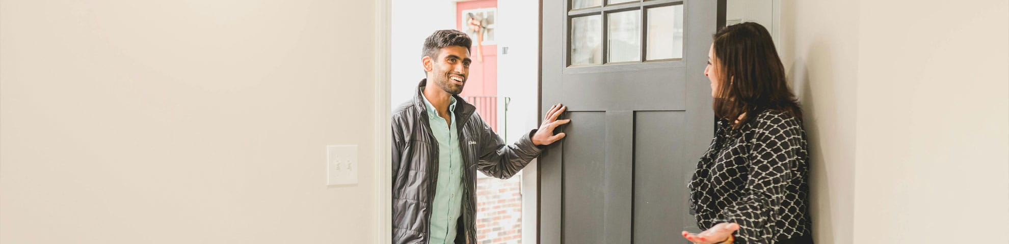 Man coming into house for a viewing